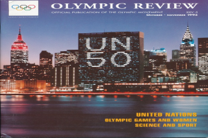 Ein Buch mit dem Titel "Olympische Spiele - Die offizielle Publikation der Olympischen Bewegung" mit einer Stadtansicht auf dem Cover, das auf einer flachen Oberfläche liegt.