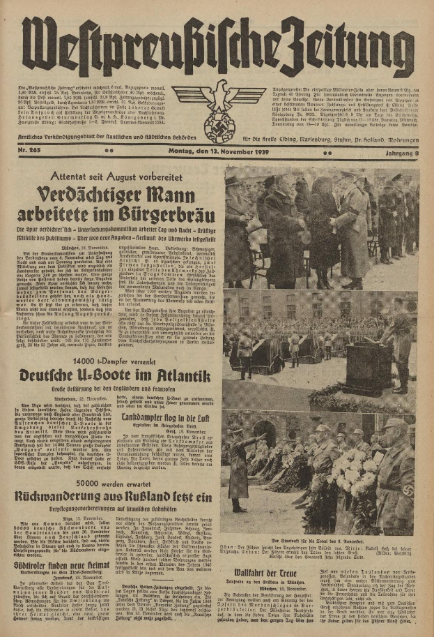 Titelseite einer deutschen Zeitung vom 13. November 1939 mit der Überschrift "Weitpreubliche Zeitung", die eine Gruppe von Menschen in traditioneller deutscher Kleidung auf einer Feierlichkeit zeigt.