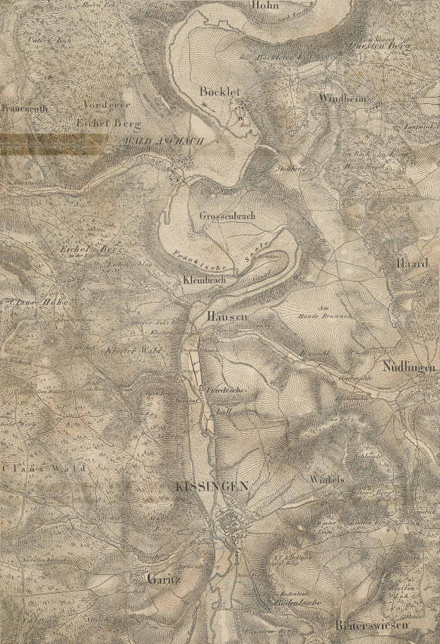 Ein altes topografisches Kartenblatt von Kissingen, Deutschland, das Straßen, Gebäude und andere Stadtmerkmale mit Textanmerkungen zeigt.