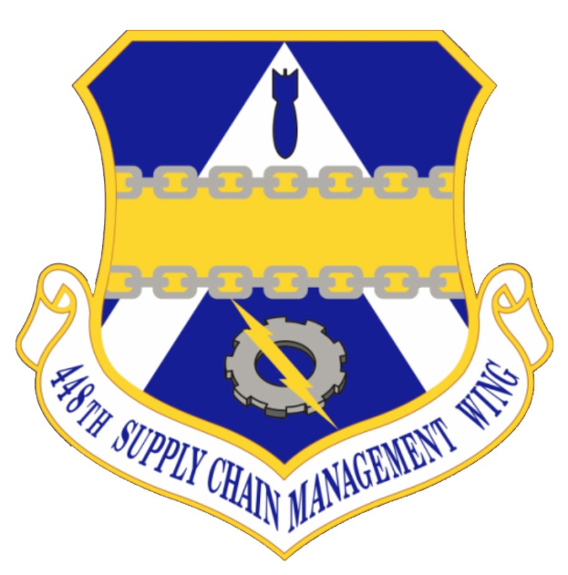 Logo der 48. Versorgungsmanagementstaffel mit einem blauen Schild mit einem weißen Stern, einem weißen Banner mit blauer Schrift 'Versorgungsmanagement' und schwarzer Schrift '48. Versorgungsmanagementstaffel' in fetter Schrift.